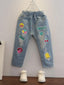 Toddler Girls Cartoon And Letter Graphic Ripped Tapered Jeans SD