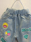 Toddler Girls Cartoon And Letter Graphic Ripped Tapered Jeans SD